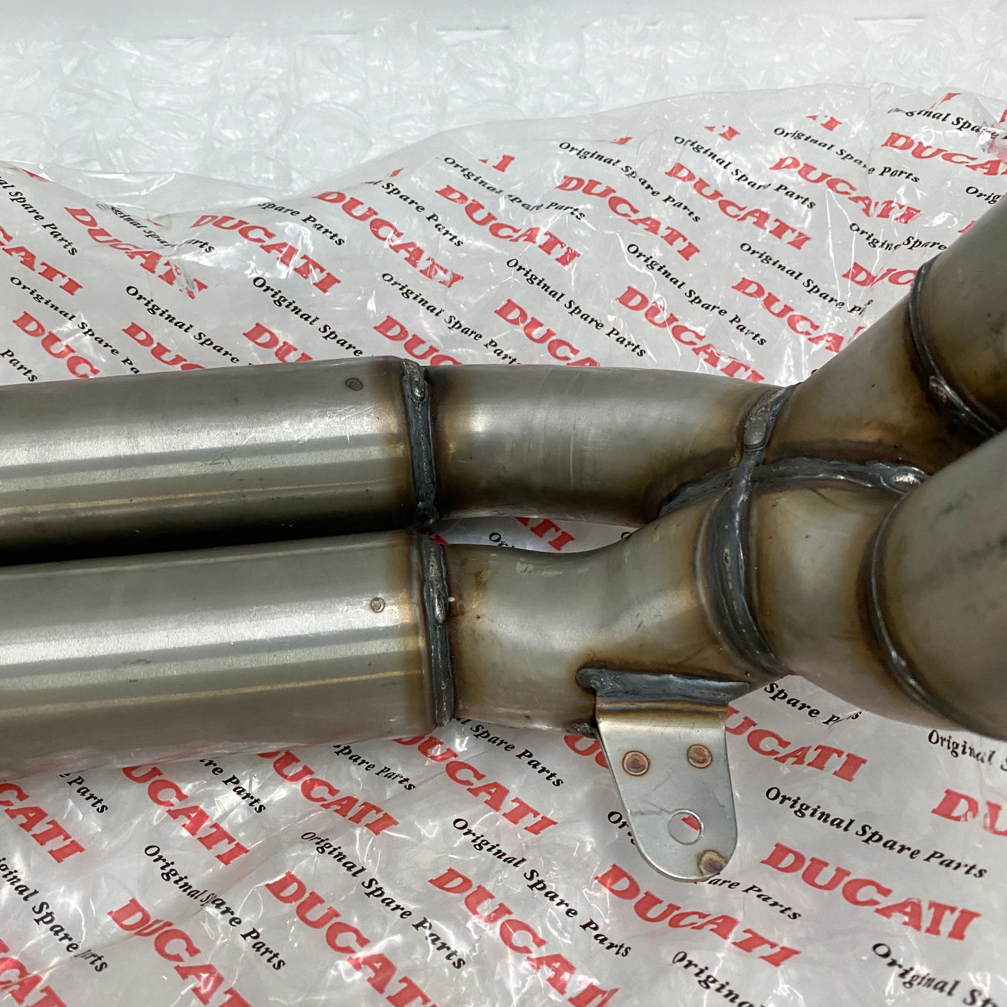 Ducati 748/916/996 Exhaust Pipe Take-Off 57010301A