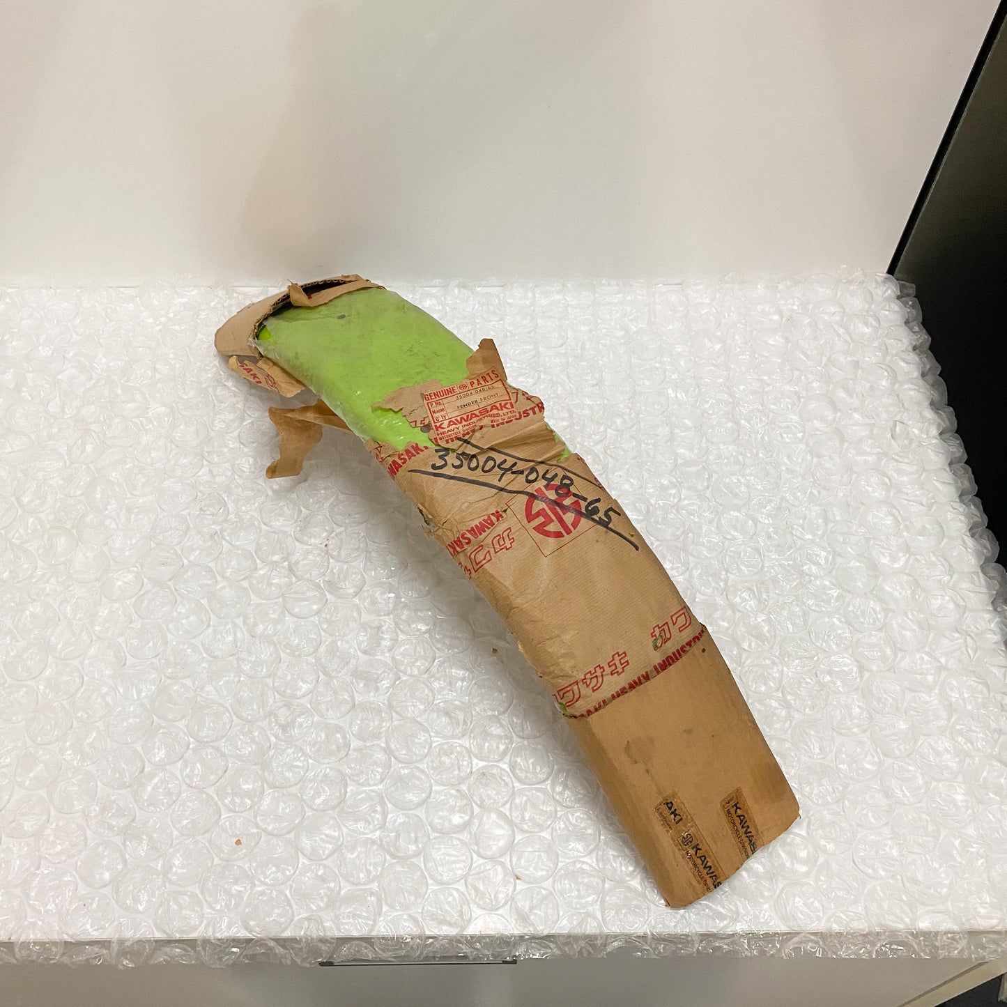 KAWASAKI FENDER-FRONT,L.GREEN 35004-048-65 NOS