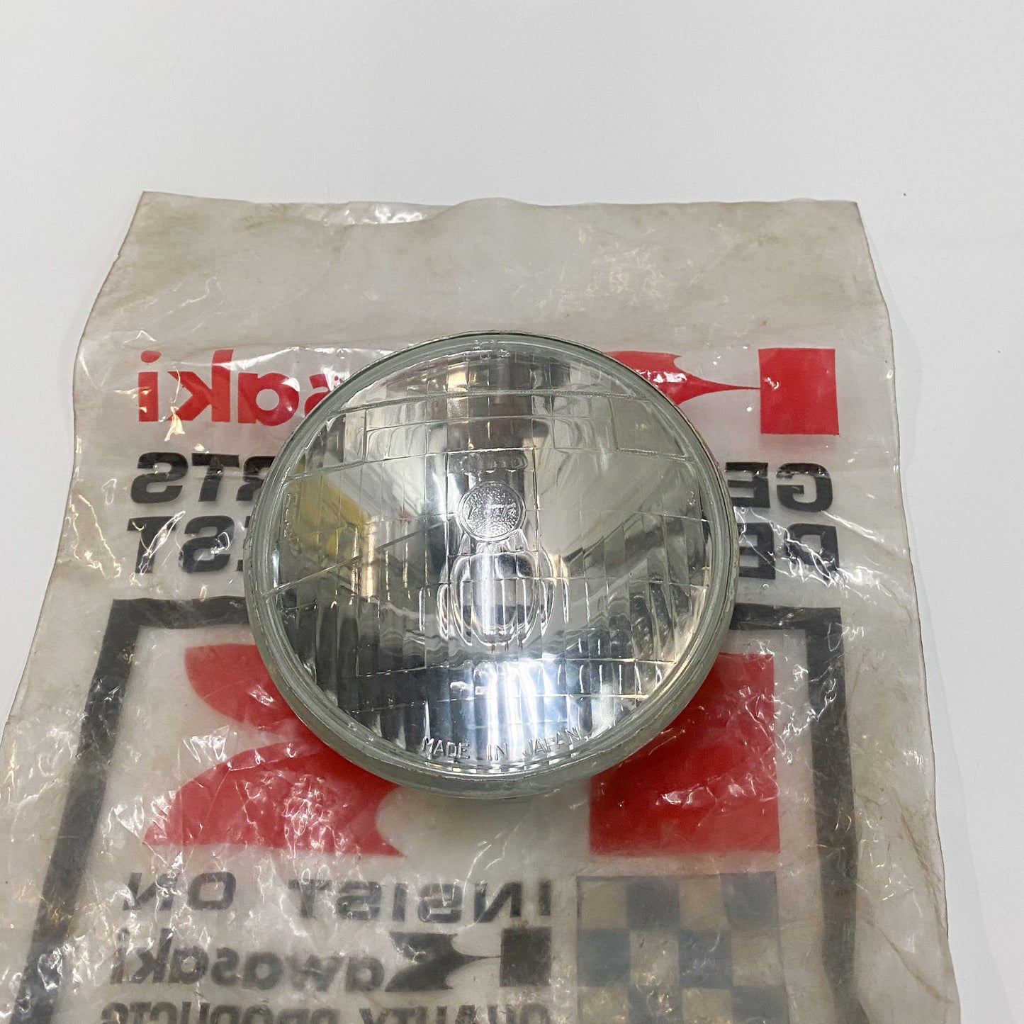 NOS KAWASAKI LENS UNIT HEAD LAMP 23007-009