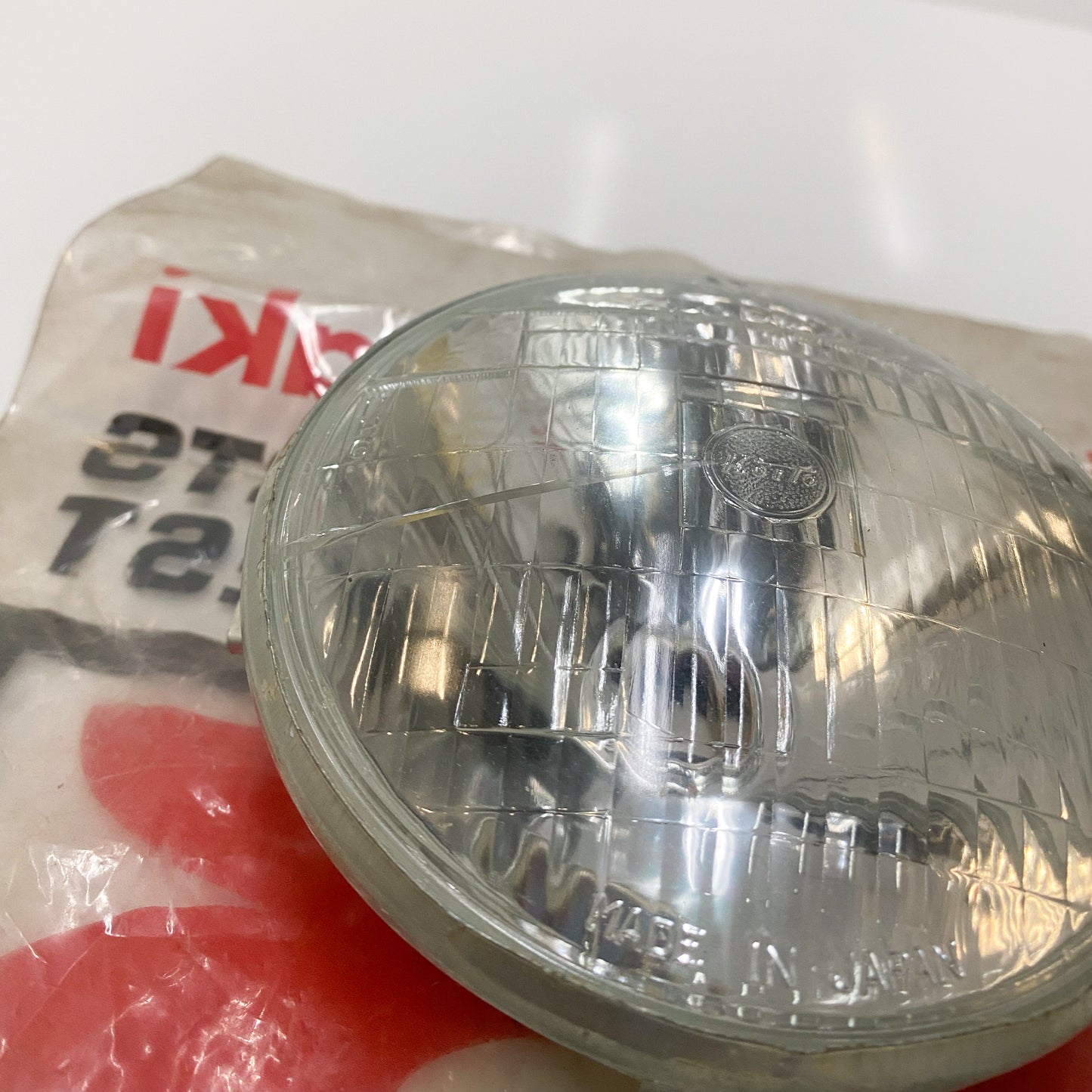 NOS KAWASAKI LENS UNIT HEAD LAMP 23007-009