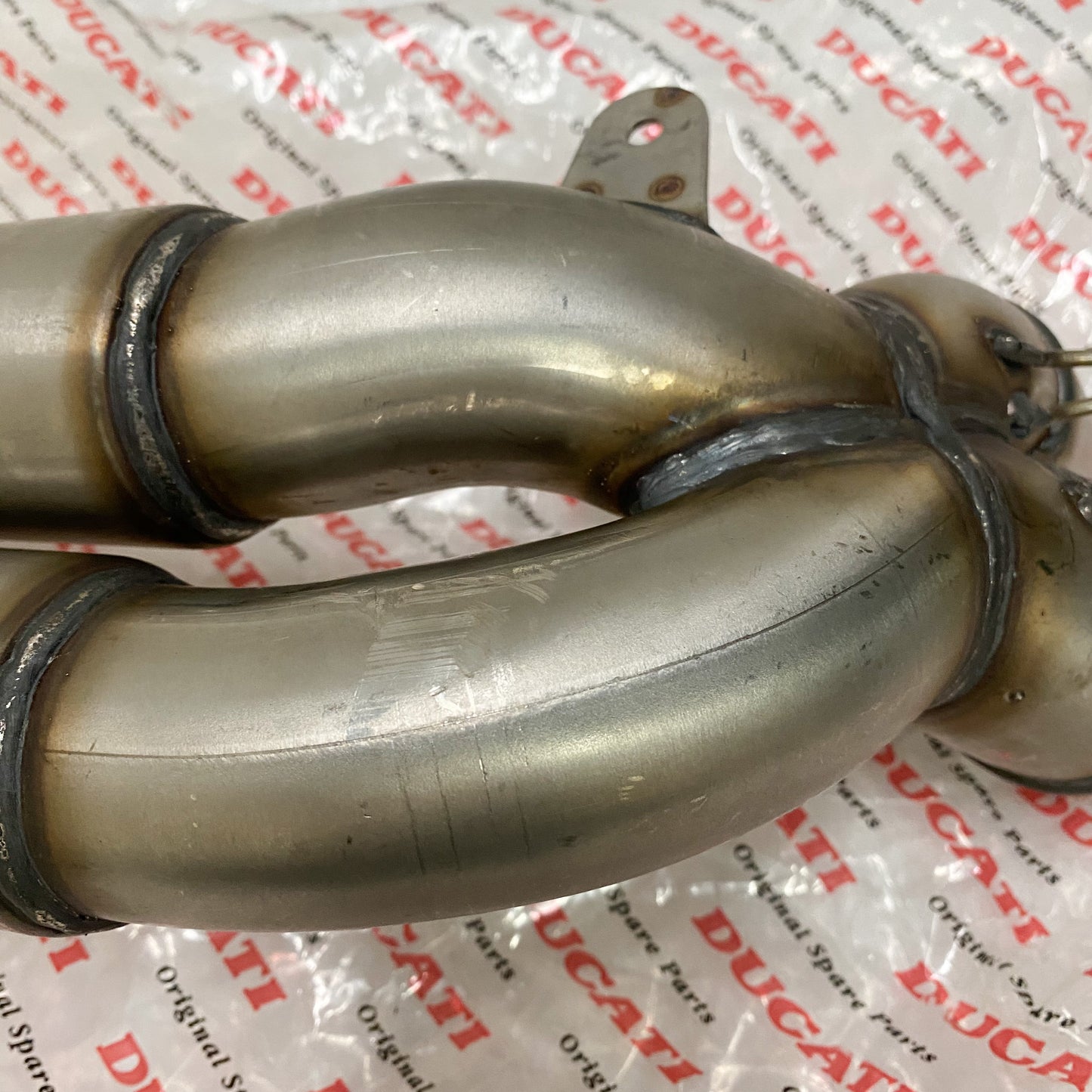 Ducati 748/916/996 Exhaust Pipe Take-Off 57010301A